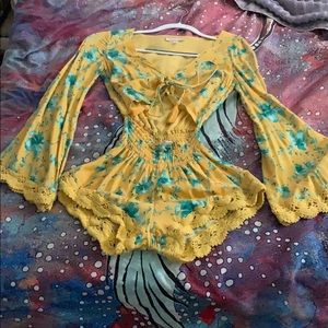 ADORABLE Romper with cuts outs size XS